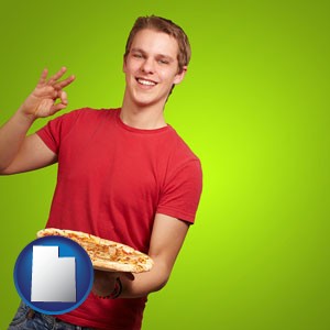 a happy teenager holding a take-out pizza - with Utah icon