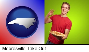 a happy teenager holding a take-out pizza in Mooresville, NC